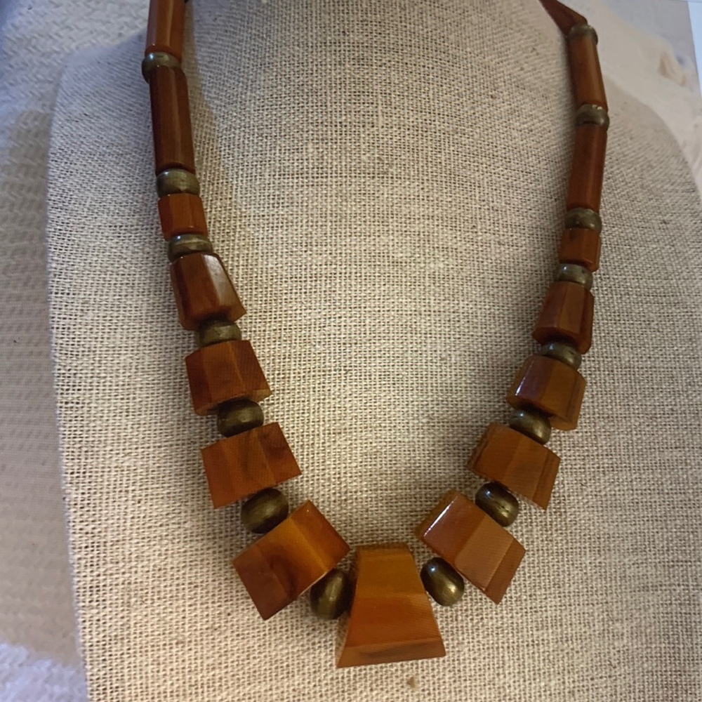 - Vintage Bakelite Necklace. Amber Coloring.